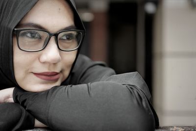 Close-up of woman in hijab looking away