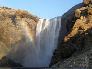 View of waterfall against sky