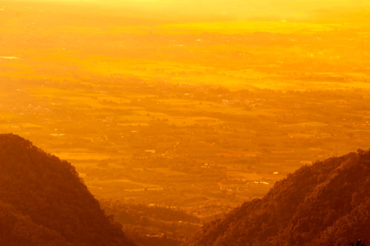 SCENIC VIEW OF LANDSCAPE AGAINST SKY DURING SUNSET