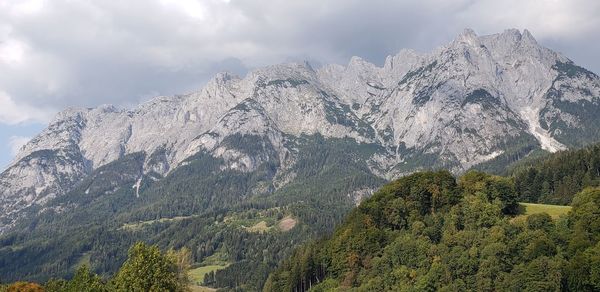 Scenic view of snowcapped mountains against sky