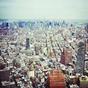 Aerial view of cityscape against sky