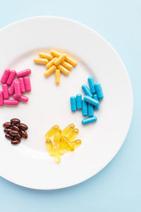 Close-up of pills on white background