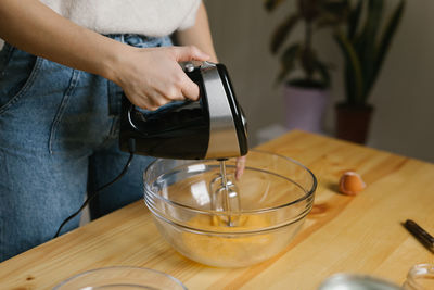 Young woman making christmas cookies