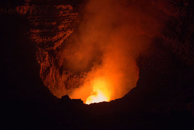 Close-up of bonfire against sky at night