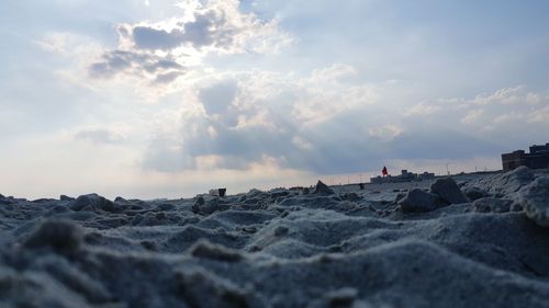 Scenic view of landscape against cloudy sky