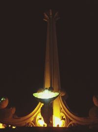 Low angle view of illuminated building at night