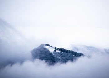 Scenic view of mountains against sky during winter