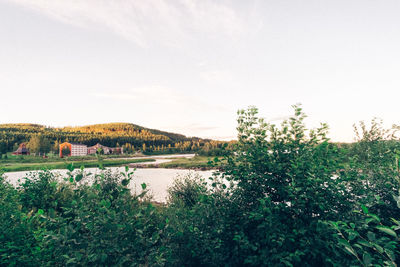 Scenic view of river against clear sky