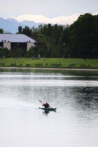 People on boat in lake