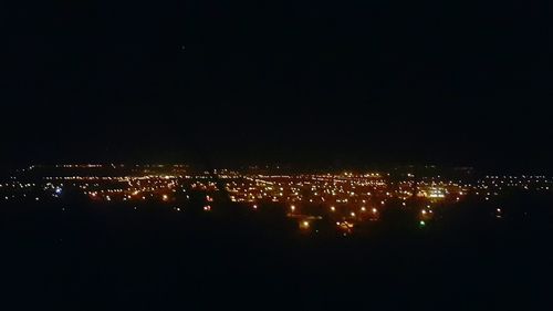 Illuminated cityscape at night