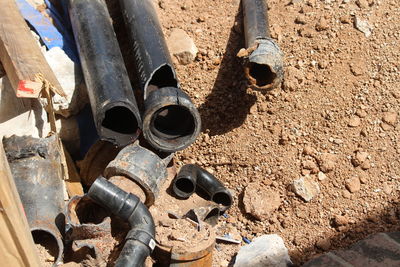 Close-up of man on pipe