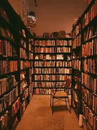 Graffiti on books in library