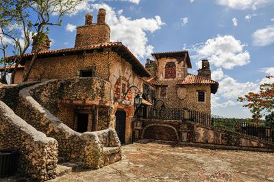 Low angle view of old building against sky