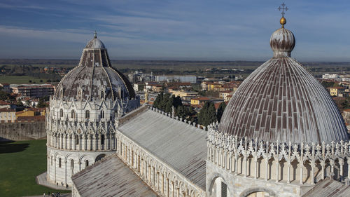 Panoramic view of buildings in city against sky