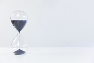 Close-up of clock on glass