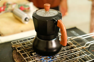 Close-up of coffee maker on burner