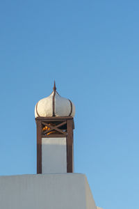 Beautiful chimneys are typical for traditional houses of lanzarote, one of the canary islands.