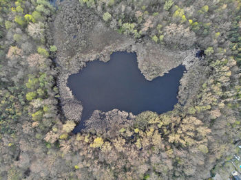 High angle view of lake seen through hole