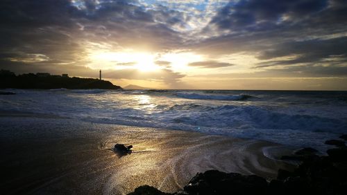 Scenic view of sea against sky during sunset