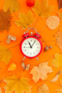 Close-up of clock on table