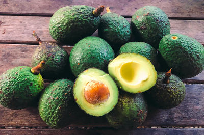 Close-up of avocados on table