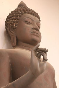 Low angle view of buddha statue