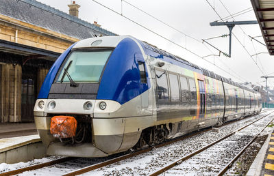 Train at railroad station in winter