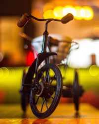 Close-up of toy bicycle against blurred background