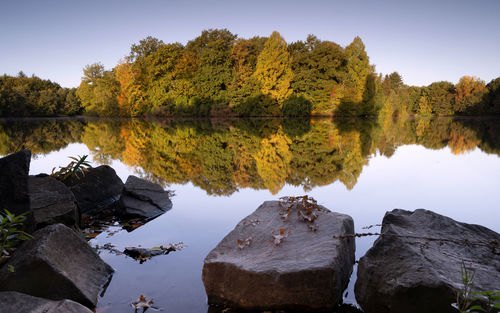 Panoramic image of beautiful and idyllic bensberg lake, bergisch gladbach, germany