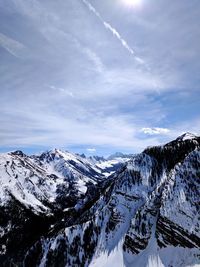 Scenic view of mountains against sky during winter