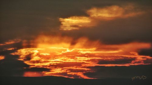 Scenic view of dramatic sky during sunset