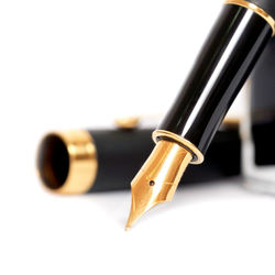 Close-up of pen against white background