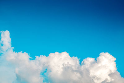Low angle view of clouds in blue sky