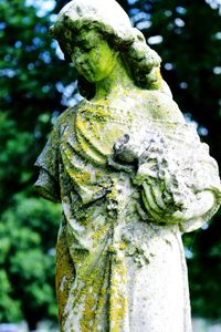 Close-up of statue in cemetery