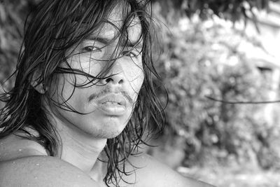 Portrait of young man on beach