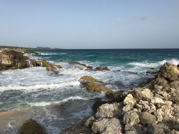 Scenic view of sea against clear sky