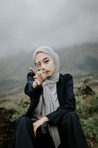 Portrait of young woman looking away