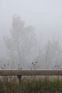 Scenic view of landscape against sky during winter