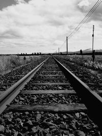 Railroad tracks against sky