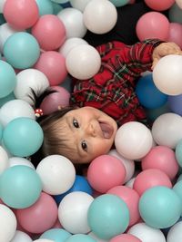 Portrait of woman with balloons