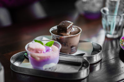 Close-up of ice cream in glass on table