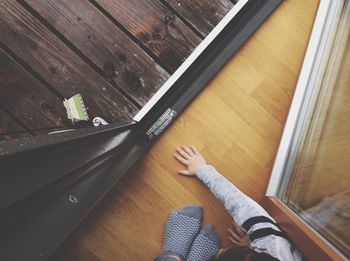 Cropped image of people by doorway