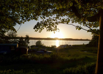 Scenic view of river during sunset