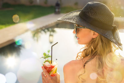 Portrait of woman holding ice cream