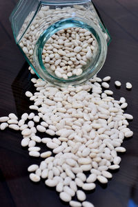 High angle view of pills in container on table