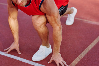 Low section of man running