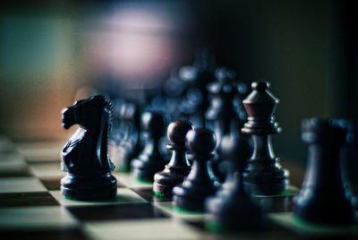 Close-up of chess pieces on chess board