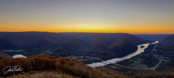 High angle view of mountains against sky during sunset