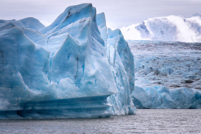 Scenic view of frozen sea against sky