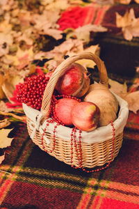 High angle view of apples in basket on table